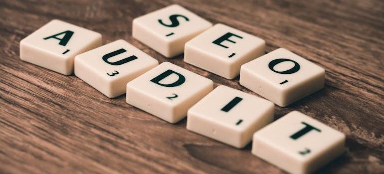 white wooden blocks spelling SEO AUDIT