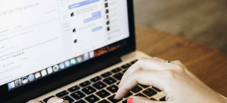 a woman chatting on the laptop