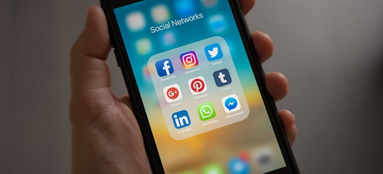 a person holding a phone in his hand 