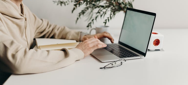 A person using a laptop to search for products and services