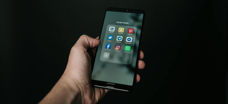 a man holding a phone in his hand