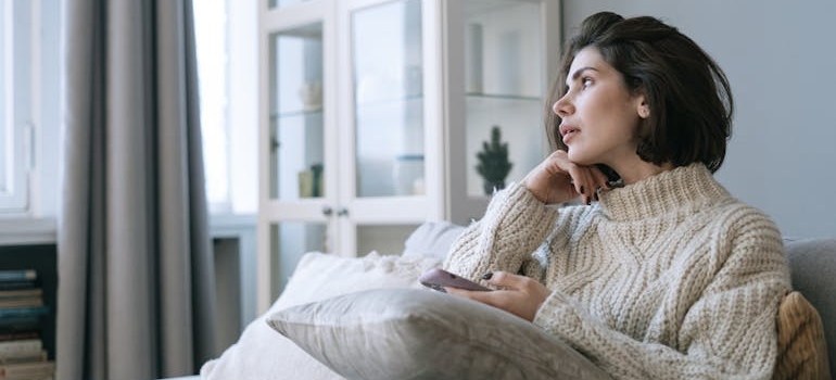 A person using their smarphone to search for mental health centers in their area