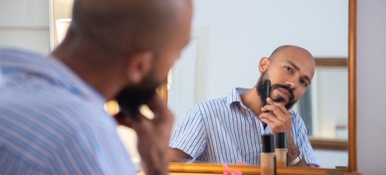 A man combing his beard