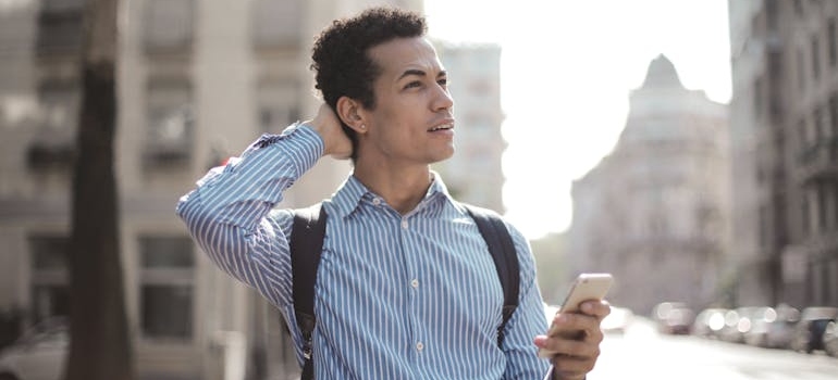 A person using their smartphone to find a place they are looking for