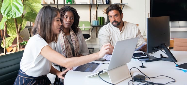 A team of experts discussing how to attract high-intent visitors to your rehab center