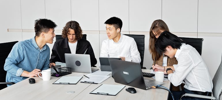 A digital marketing team discussing user experience fixes that will lower bounce rates