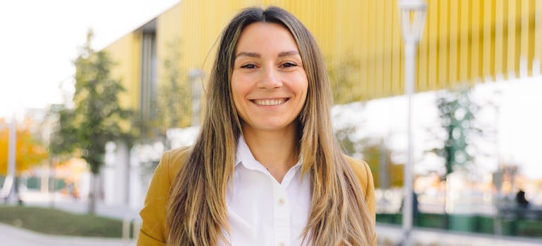 A smiling person, happy after a successful rehab 