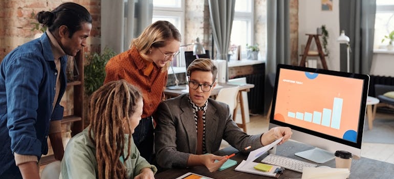 A digital marketing team discussing the best practices engaging patients during the holiday season