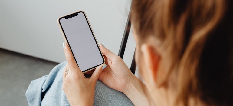 A person using a mobile phone