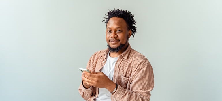 A person using a mobile phone to search online