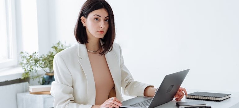 A businessperson using a laptop