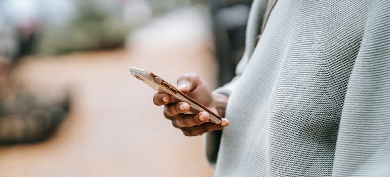 A person using a mobile phone to look for professional help