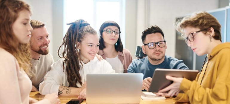 A group of marketing experts discussing how to reduce drop-off rates in rehab admissions