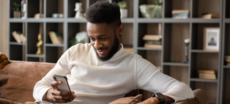 A person browsing the website of a rehab center that knows how to improve phone conversion rates