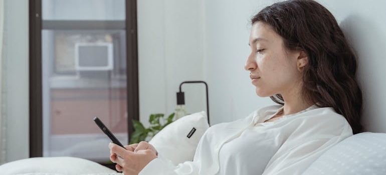 A person using a smartphone to look for aesthetic clinics