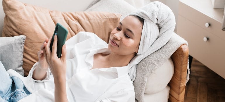 A person looking at images of a clinic that knows how to use before and after photos to build trust