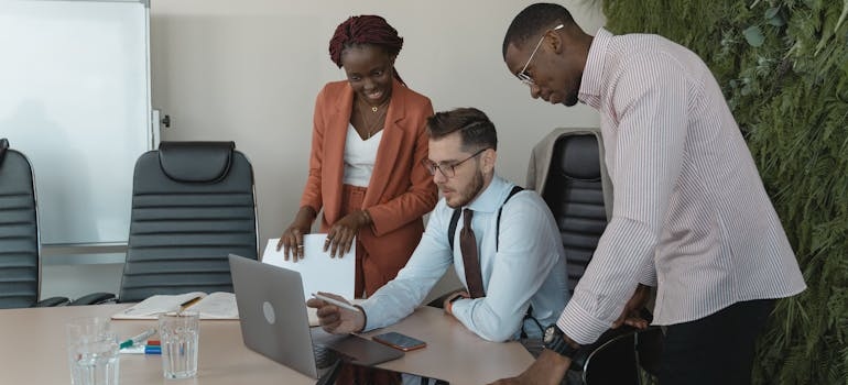 A group of marketing experts discussing why a mobile-friendly admissions process increases conversions