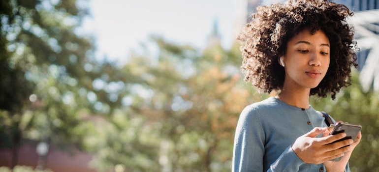 A person looking at an online ad of a medspa center that knows why location-based ads work