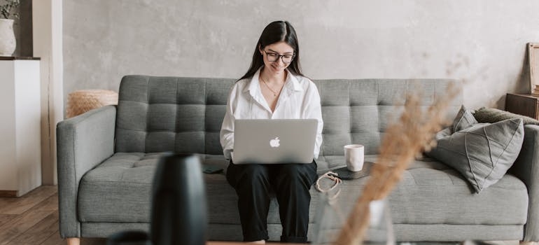 A person sitting and reading an email