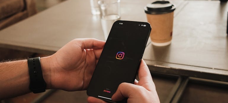 A person using Instagram, a platform companies use for paid social media advertising