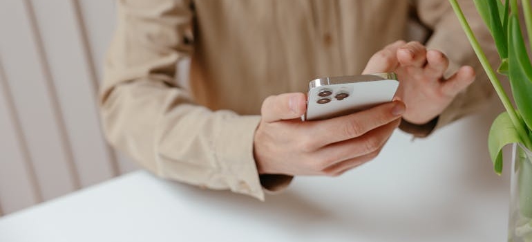A person using a smartphone to look for a therapist