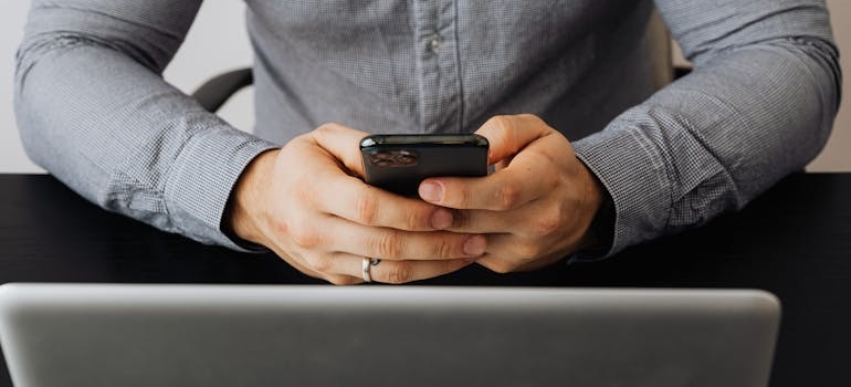 A person reading an email of a company that uses proven strategies for creating localized content for Canada