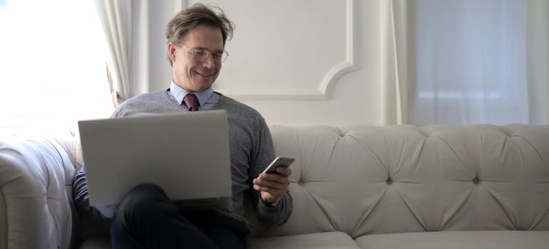 A person reading an email from a center that utilizes email journeys that keep alumni engaged and reduce relapse risk