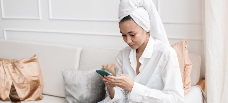 A person using a smartphone to look for med spas