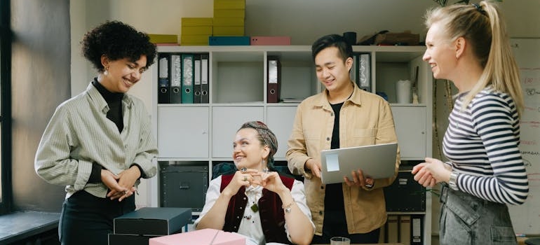 A team of digital marketing experts discussing how to advertise through Google
