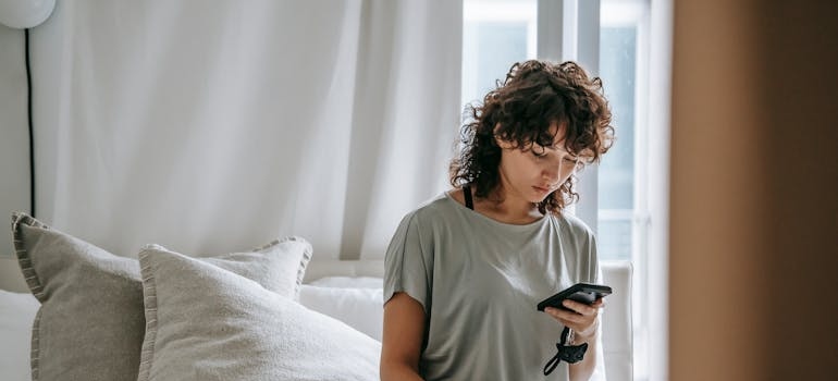 A person using their smartphone to look for answers about mental health