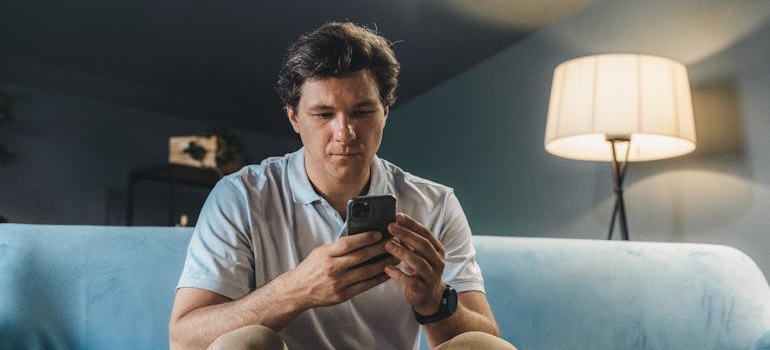 A person using a smartphone to look for therapists