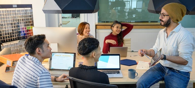 A digital mareketing team discussing the impact of 5G on digital marketing