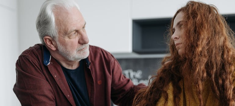 A father talking to his daughter about addiction issues after learning about it thanks to email campaign ideas to engage alumni and families