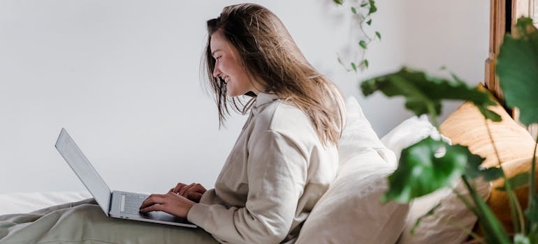 A person using a laptop to look for ABA centers