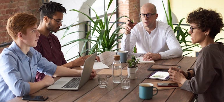 A digital marketing team during a meeting on why SAMHSA listings still matter to families
