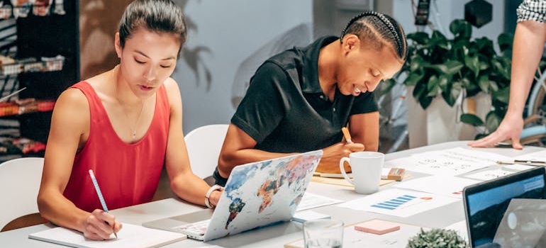 A digital marketing team during a meeting discussing what Google needs from your clinic beyond a Business Profile