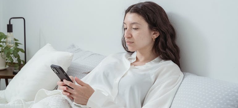 A person using a smartphone to look for healthcare services