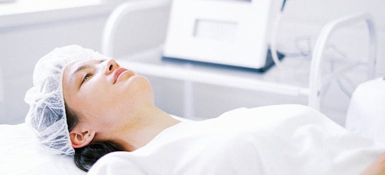 A person in an aesthetic clinic during a procedure