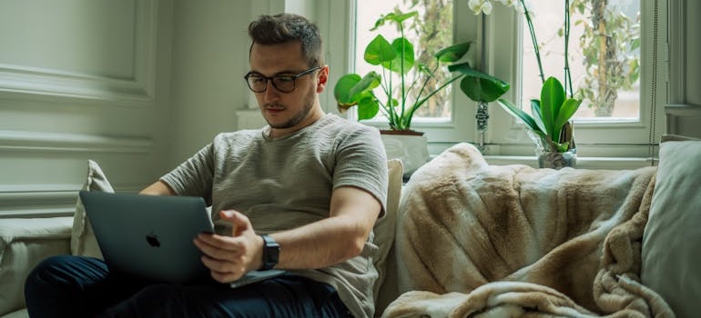A person using a laptop to look for healthcare services