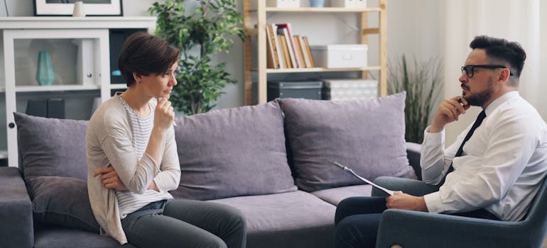 A person talking to a therapist of a center that understands why healthcare websites must adapt to AI search